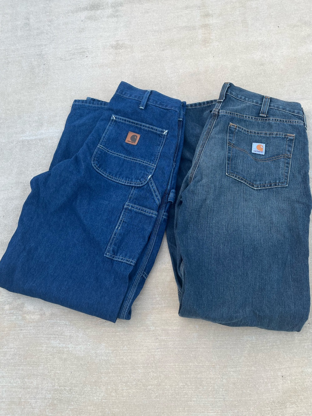 Set of Vintage Carhartt Men’s Relaxed Jeans size 33x34 - Dark Blue and Medium